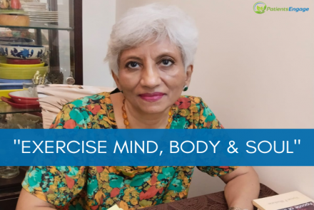 Profile picture of the author Usha Jesudasan at a desk with the text overlay on blue strip Exercise Mind, Body and Soul