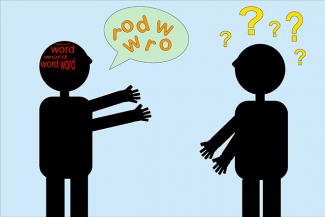 Image: Stock image of two people communicating with each other but the words in the speech bubbles are jumbled