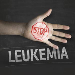 Stock pic of a poster that shows a hand with Stop printed on it and Leukemia below the hand 