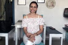 Pic shows Aditi sitting confidently with her vitiligo patches
