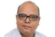 Image Description: A head shot of Mr. Akhileshwar Sahay with spectacles as he shares his experience of living with Bipolar, Depression and COPD