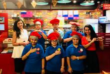 Minu Budhia and Preeyam Budhia with the team at ICanFlyy a special needs cafe