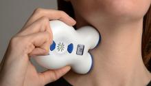Image of Vagus Nerve Stimulator Gammacore on the neck of a person to help with Migraine Pain