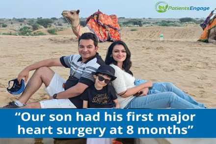 Pic of a young boy flanked by his parents in front of a camel in a desert. Text overlay Or son had his first major heart surgery at 8 months