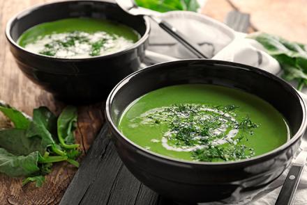 Nutritious and protein rich spinach soup in 2 bowls for oral cancer patients
