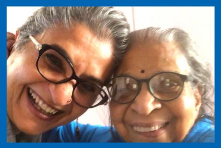 Lalitha on the right and her daughter Viji Venkatesh on the left smiling at the camera