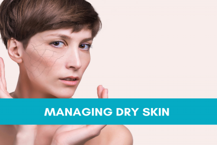 Stock photo of a short haired woman with patches of dry skin and a text overlay of Managing Dry Skin