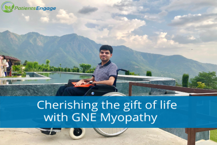 Rushabh, a person with GNE Myopathy on a wheelchair in an outdoor setting with text overlay of Cherishing the gift of life with GNE Myopathy
