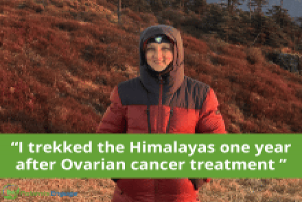 Picture of the author in the hills and the text overaly I trekked the himalayas one year after Ovarian Cancer Treatment