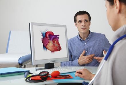 A doctor discussing a heart options with a patient
