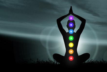 Stock pic of a person in meditation in silhouette depicting mantra