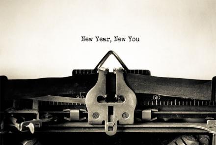 Sepia tone image of typewriter with the typed words - New Year, New You